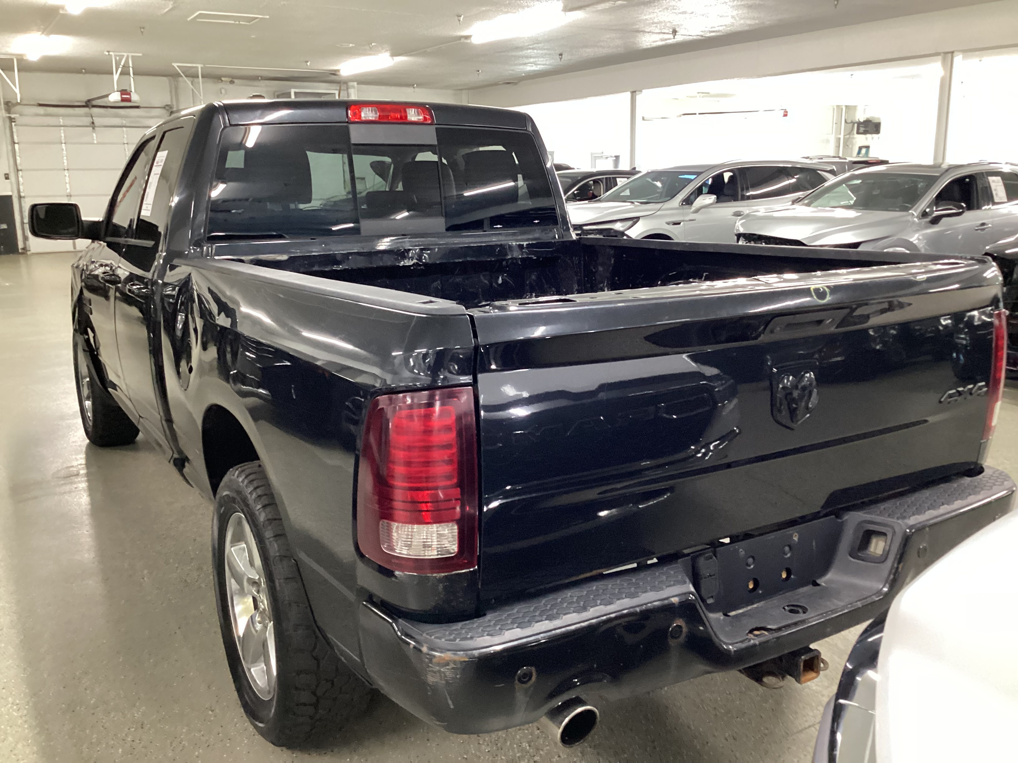 2016 RAM 1500 4WD Quad Cab Sport - Image 2